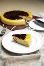 Blueberry Cheesecake slice include caramel with fork and knife served in plate isolated on table top view of cafe bake food Royalty Free Stock Photo