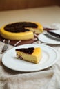 Blueberry Cheesecake slice include caramel with fork and knife served in plate isolated on table top view of cafe bake food Royalty Free Stock Photo