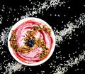 Blueberry Cherry swirled in yogurt with Granola