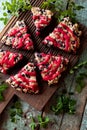 Blueberry cutted scones on oak cutboard with blueberry leaves