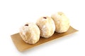 Blueberry donuts on bamboo dish. Royalty Free Stock Photo