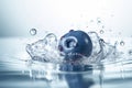 blueberry falling in water water splash on blue background