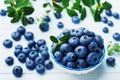 Blueberry or great bilberry in bowl on blue vintage table. Organic superfood and healthy nutrition. Royalty Free Stock Photo