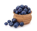 Blueberry isolated on white background. A pile of fresh blueberries in a wooden bowl Royalty Free Stock Photo