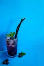 Blueberry juice with ice and mint. Cocktail. Royalty Free Stock Photo