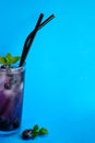 Blueberry juice with ice and mint. Cocktail. Royalty Free Stock Photo