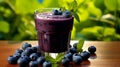 Blueberry Juice Resting on a rustic wooden table