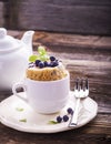 Blueberry Microwave Muffin in mug . Selective focus Royalty Free Stock Photo