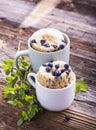 Blueberry Microwave Muffin in mug . Selective focus Royalty Free Stock Photo