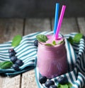 Blueberry Milkshake Smoothie On Wooden Rustic Table