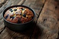 a blueberry muffin in a pan