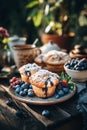 Delicious Blueberry Muffins on Rustic Table With Fresh Berries and Warm Tea in Cozy Setting Royalty Free Stock Photo
