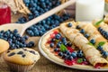 Blueberry muffins and pancakes Royalty Free Stock Photo