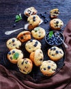 Blueberry muffins on a rustic wooden background Royalty Free Stock Photo