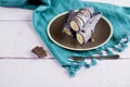 Blueberry pancakes stuffed with whole banana wrapped in a tube and poured with chocolate Royalty Free Stock Photo