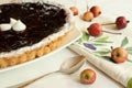 Blueberry pie with decorative little apples