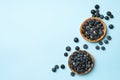 Blueberry pies on blue background, top view Royalty Free Stock Photo