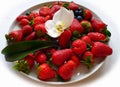 Red Sweet Strawberry desert With orchid on White Plate Royalty Free Stock Photo