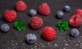 Blueberry and raspberry on black background Royalty Free Stock Photo