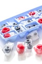 Blueberry and raspberry in ice tray on stone background Royalty Free Stock Photo