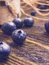 Blueberry on a rustic wooden background