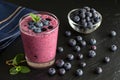 blueberry smoothi on black background, HDR image - generated by ai Royalty Free Stock Photo