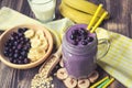 Blueberry smoothie with banana and oat flakes