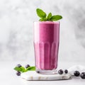 Blueberry Smoothie In Glass With Mint Garnish Royalty Free Stock Photo