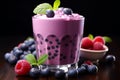 Blueberry smoothie or milkshake with fresh berries, a healthy breakfast