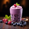 Blueberry smoothie or milkshake with fresh berries, a healthy breakfast