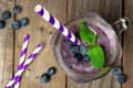 Blueberry smoothie with mint in mason jar above view Royalty Free Stock Photo