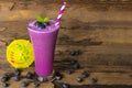 Blueberry smoothie purple colorful fruit juice milkshake blend beverage healthy high protein the taste yummy In glass,drink episod Royalty Free Stock Photo