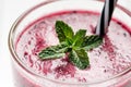 Blueberry smoothie on a wooden white background. Glass of smoothie with berry and mint. Fruit Healthy food. Breakfast. Royalty Free Stock Photo