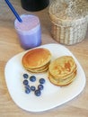 Blueberry smoothies and pancakes