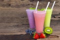 Blueberry strawberry and kiwi smoothies colorful fruit juice milkshake. Royalty Free Stock Photo