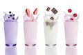 Blueberry, strawberry, raspberry and chocolate milk shakes