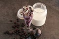 Blueberry vanilla ice cream chocolate shake served in glass isolated on table side view of healthy drink