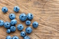 Blueberry on wooden table background. Ripe and juicy fresh picked blueberries closeup, top view Royalty Free Stock Photo