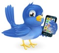 Bluebird with mobile phone Royalty Free Stock Photo