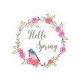 Bluebird sitting on a rose flower wreath with spring wishes