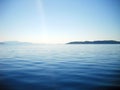 Blueness of Ionian sea and islands and ray of light Royalty Free Stock Photo