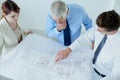 Blueprint, architecture or top view of team planning project, maintenance or renovation in meeting. Civil engineering Royalty Free Stock Photo