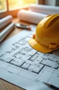Blueprint floor plan architectural project with hardhat, pen, rolled documents. Plan features engineering, planning, industry Royalty Free Stock Photo