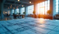 Blueprint of modern building lies on table in office interior. Engineering scheme with structure plan for constuction project. Royalty Free Stock Photo