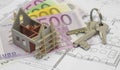 Architectural plan with euro banknotes and house keys Royalty Free Stock Photo