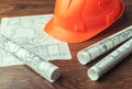 Blueprint rolls and set of construction tools Royalty Free Stock Photo