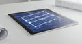 Blueprint on Tablet A tablet displays architectural blueprints showcasing modern design and technology in the field of Royalty Free Stock Photo
