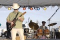 Blues band performing at a festival