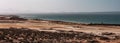 Blues, brown, sand and water beautiful scene small twon coche margarita island Royalty Free Stock Photo