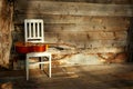 Blues guitar on a white chair with a wooden backgr Royalty Free Stock Photo